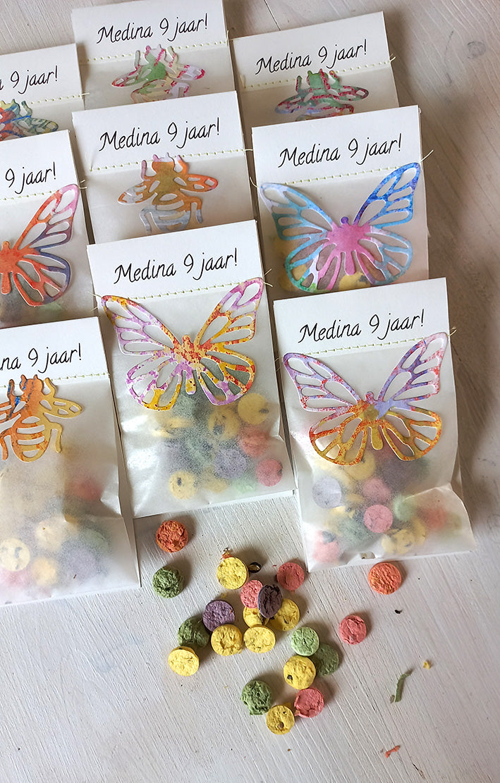 bloemenzaad confetti zakjes met vliender decoratie